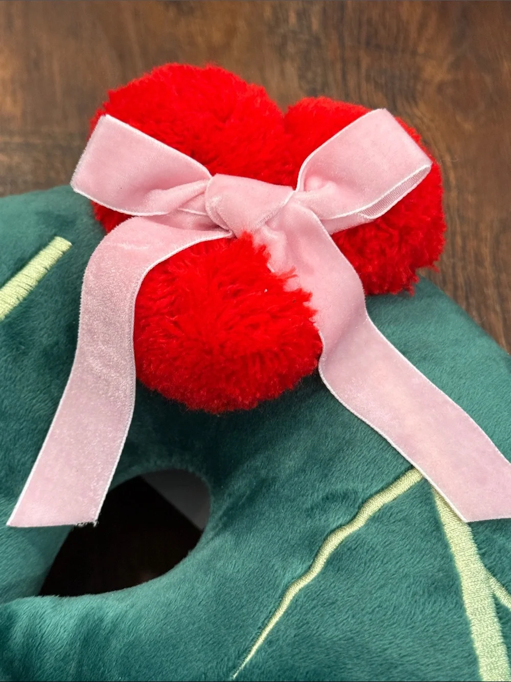 Green Holly Leaf Throw Pillow Pair with Red Pom Accents